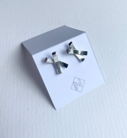 Criss-cross silver line stud earrings