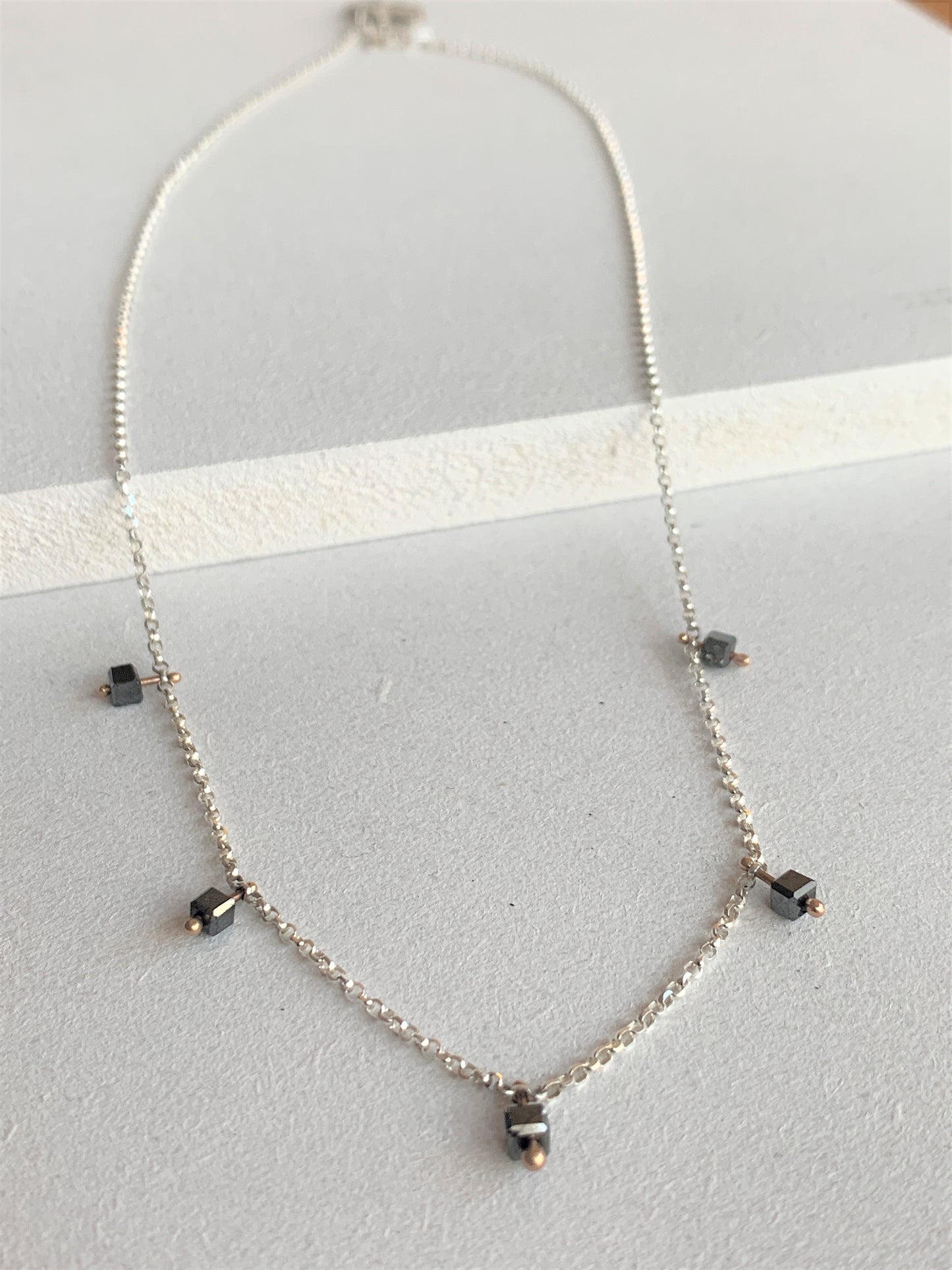 Dazzle 5 rough black diamond necklace with 9ct rose gold and silver