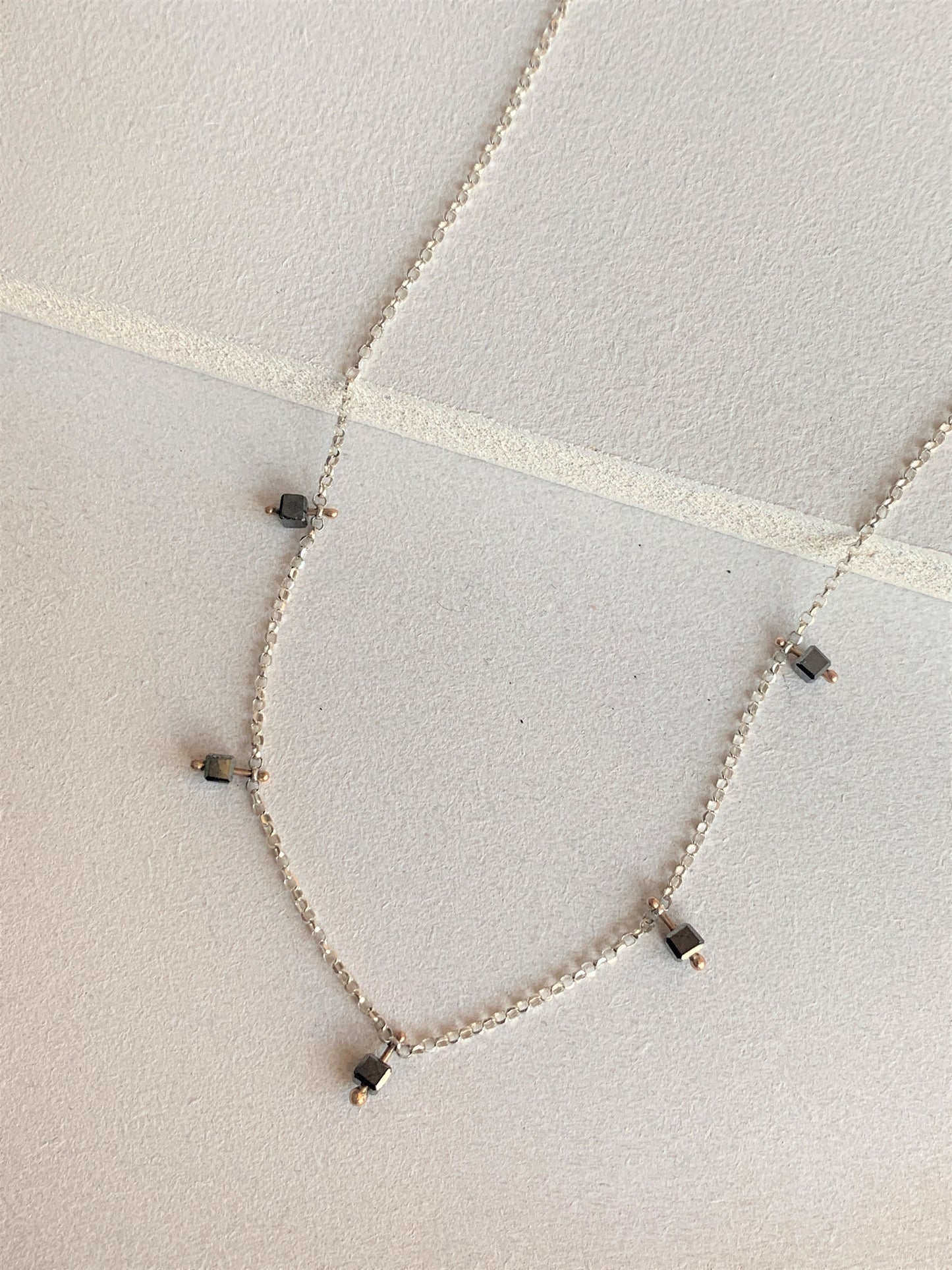 Dazzle 5 rough black diamond necklace with 9ct rose gold and silver
