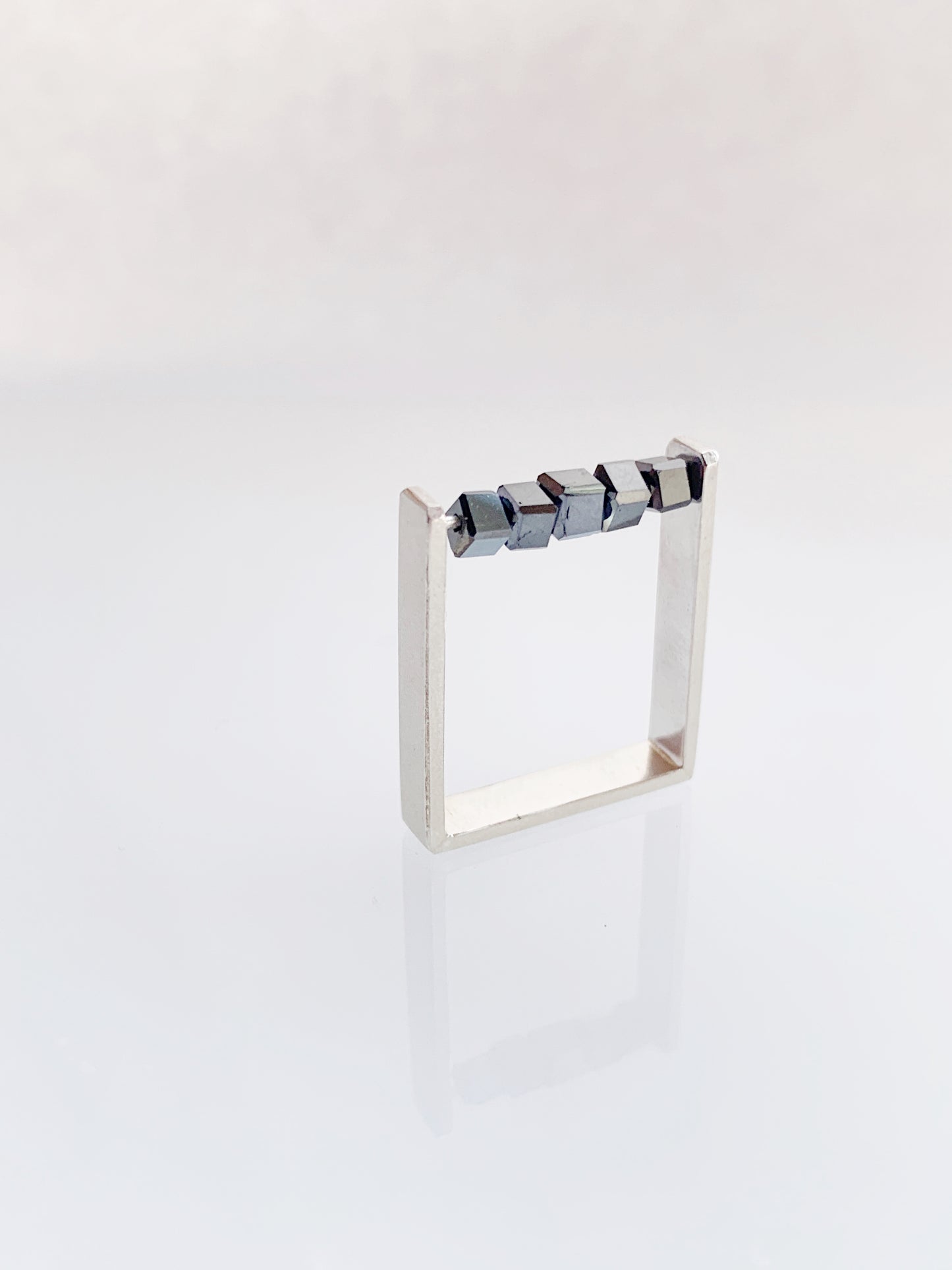ABACUS I - Single Diamond Row of Beads Square Ring